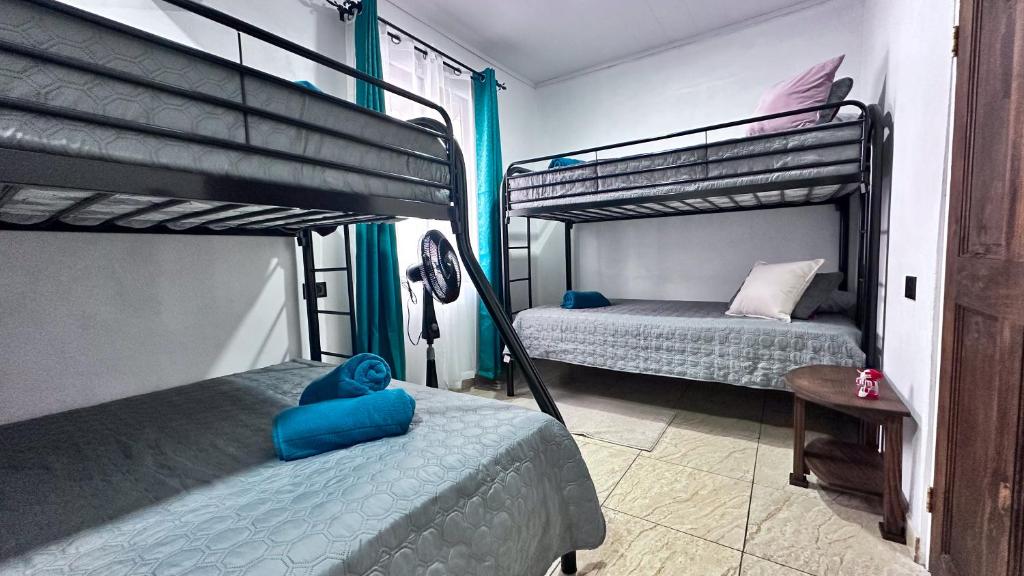 Postel nebo postele na pokoji v ubytování Brisa Amatista - Casa completa y centrica en San Ramón #1