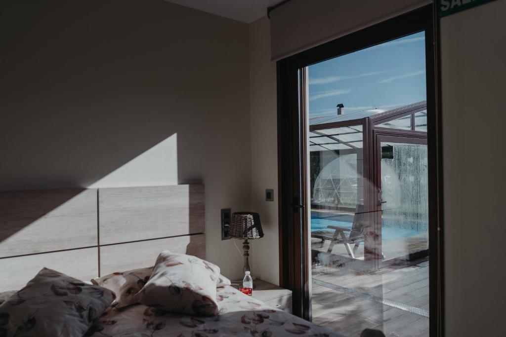 Postel nebo postele na pokoji v ubytování Casa Rural La Costana de Barbadillo