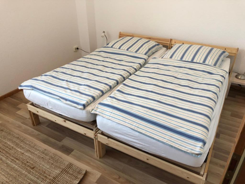 Postel nebo postele na pokoji v ubytování Das Abendrote Haus