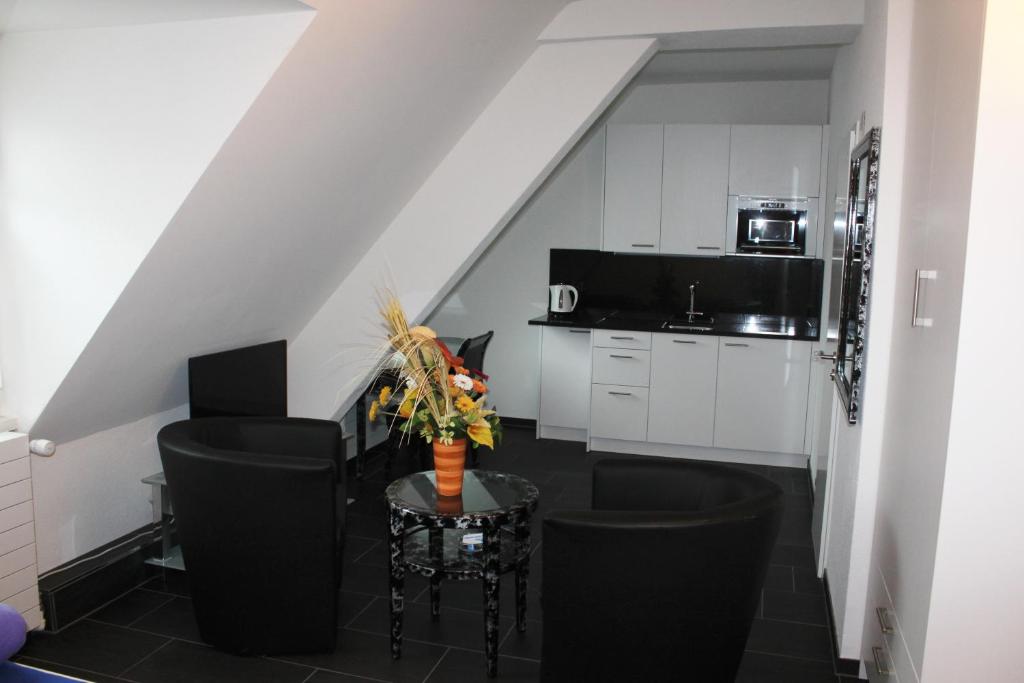A kitchen or kitchenette at Seefeld Residenz