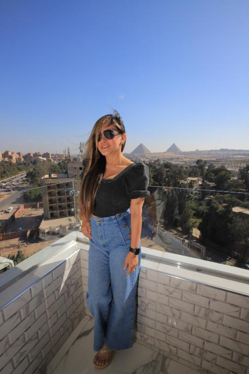 Hosté ubytování WOW Pyramids Inn With Rooftop Lounge