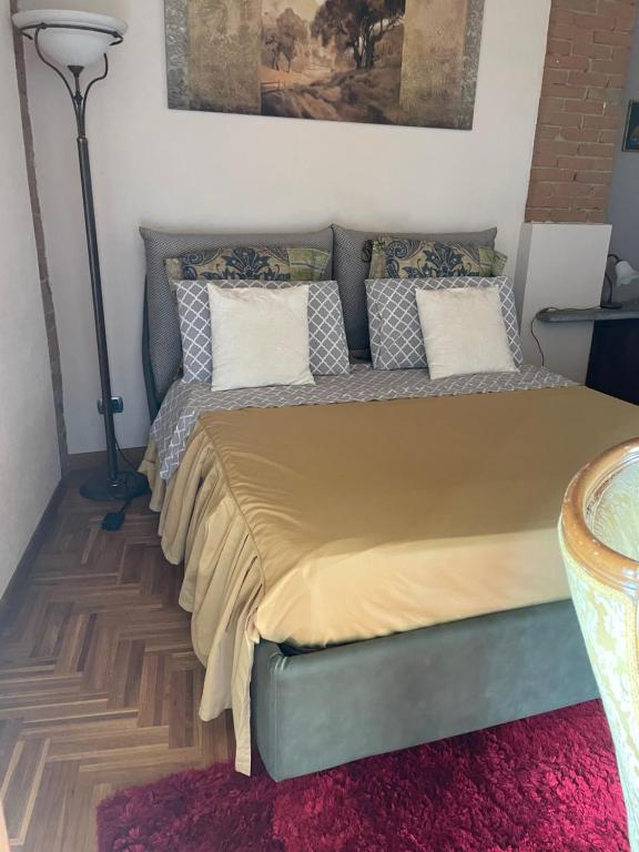 Postel nebo postele na pokoji v ubytování Cascina Baresane