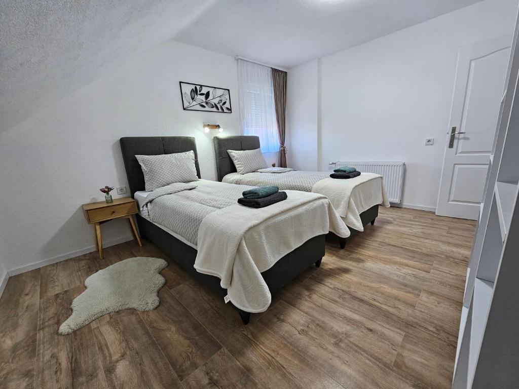 Postel nebo postele na pokoji v ubytování ANA