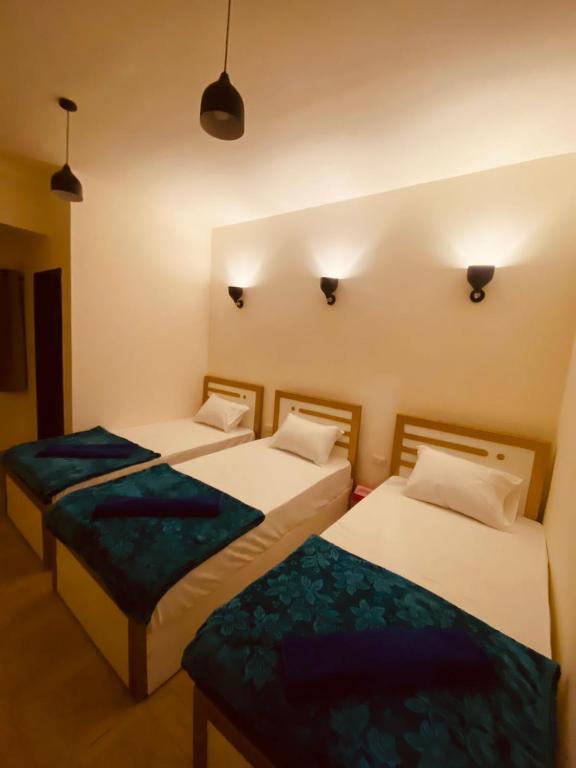Postel nebo postele na pokoji v ubytování Brother Hotel Dahab