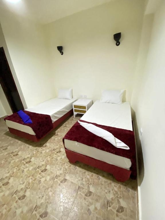 Postel nebo postele na pokoji v ubytování Brother Hotel Dahab