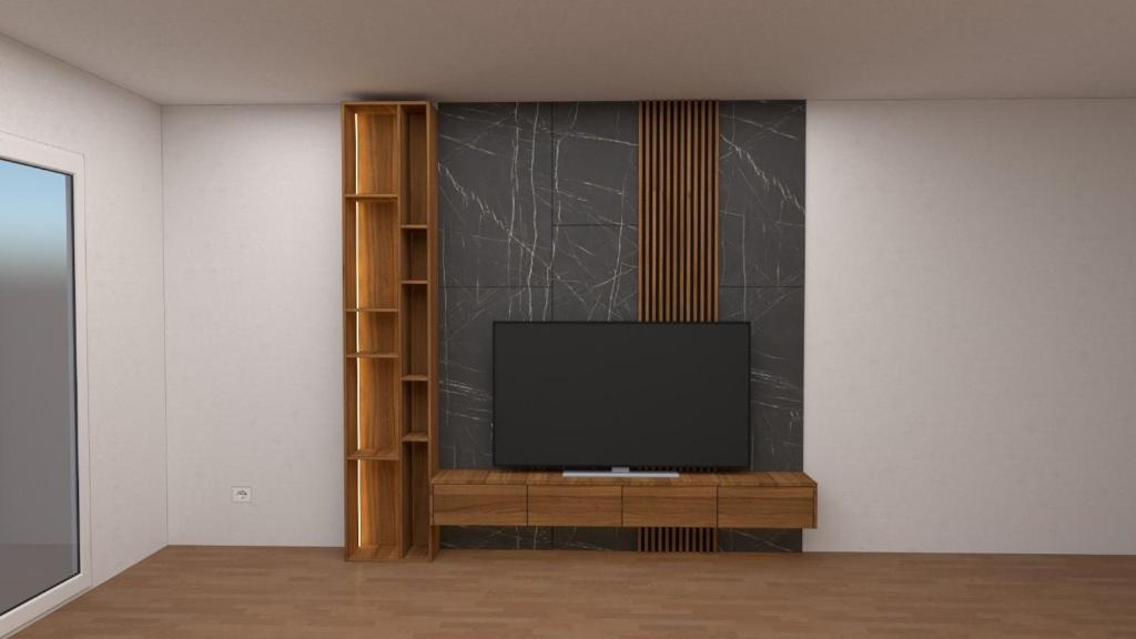 TV a/nebo společenská místnost v ubytování Apartment for rent in Deçan