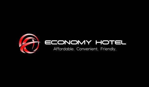 a logo for an economy hotel on a black background at Economy Hotel Glenwood in Decatur