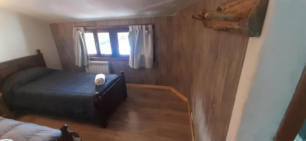 Postel nebo postele na pokoji v ubytování Hostería Copahue