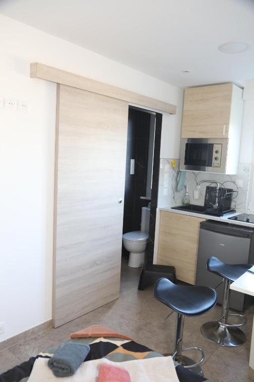 Charmant studio en centre-ville – photo 18