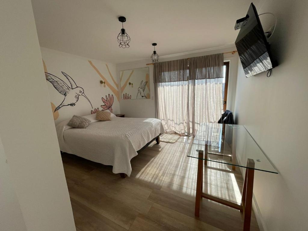 TV a/nebo společenská místnost v ubytování HOSTAL LA MODERNA
