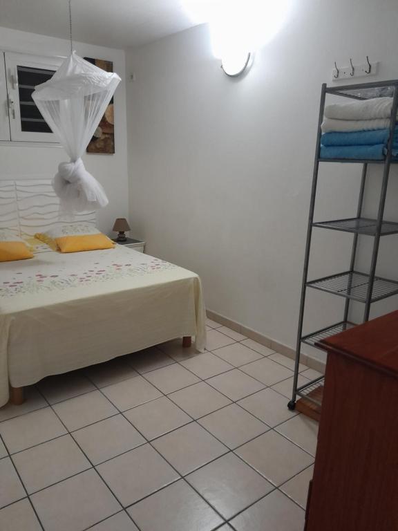 Postel nebo postele na pokoji v ubytování KAY MIT et KAY JACKO