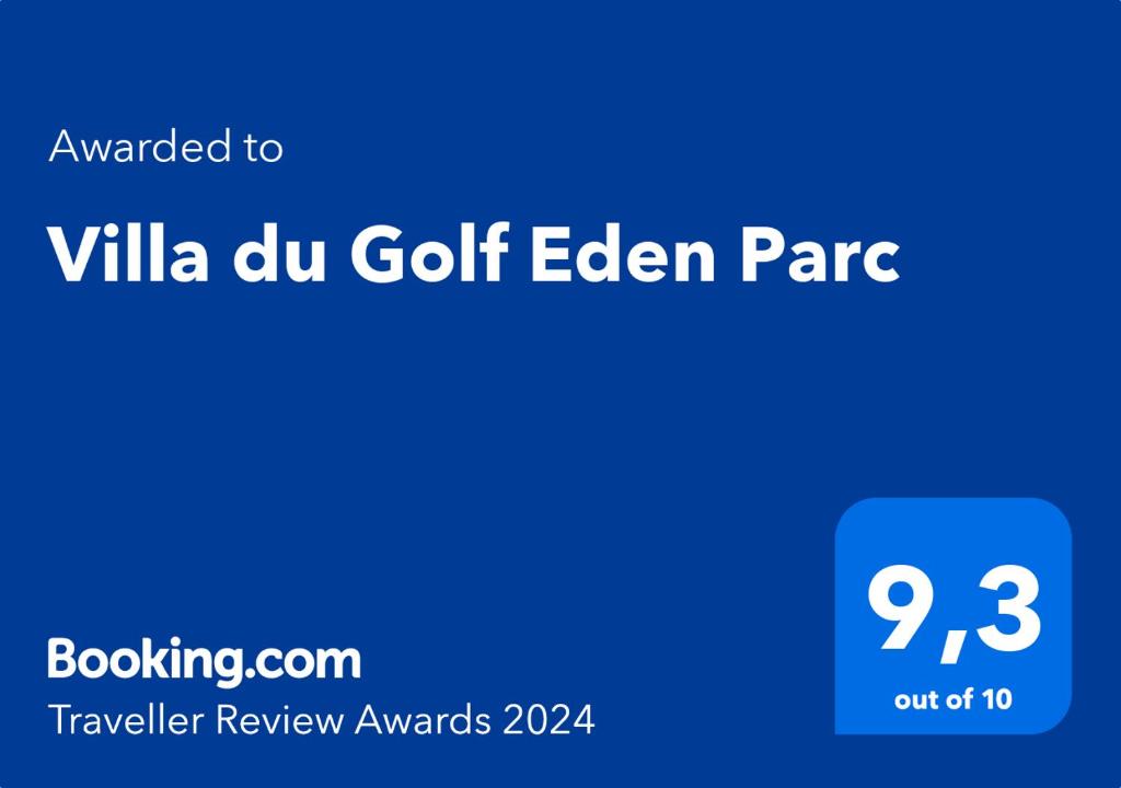 un panneau bleu avec les mots villa du golf eden gate dans l'établissement Villa du Golf Eden Parc, à Lacanau-Océan