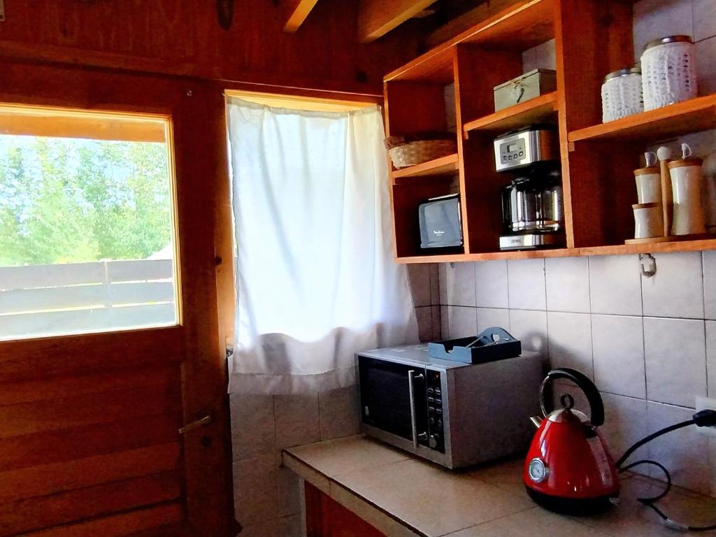 Kuchyň nebo kuchyňský kout v ubytování Cabaña los teros