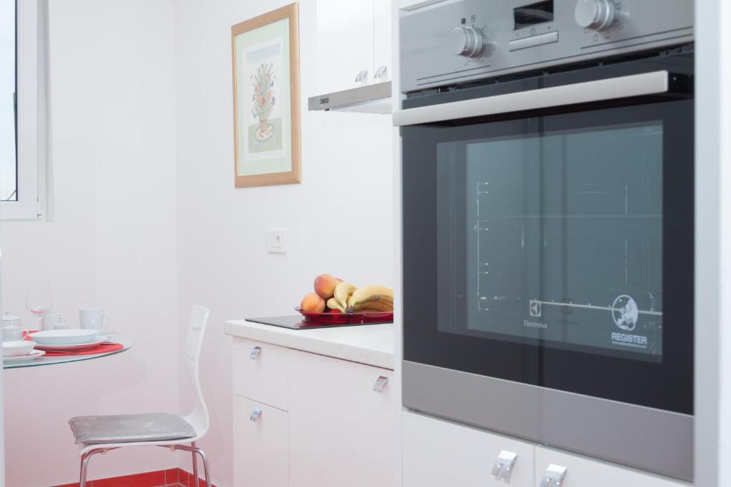 Kuchyň nebo kuchyňský kout v ubytování Amanda Apartment