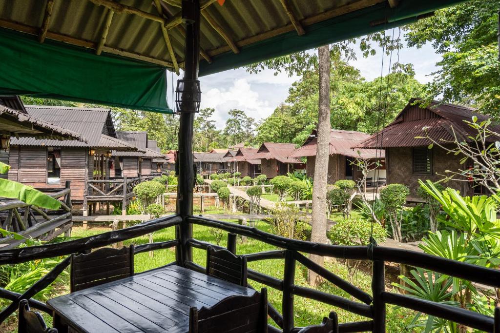 a view of a village from the porch of a house at Mook Lanta Eco Resort in Ko Lanta
