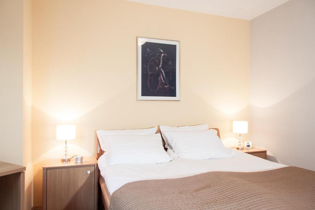 Postel nebo postele na pokoji v ubytování Apartment Avenue