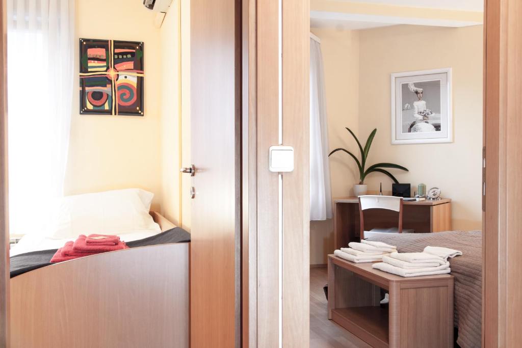 Postel nebo postele na pokoji v ubytování Apartment Avenue