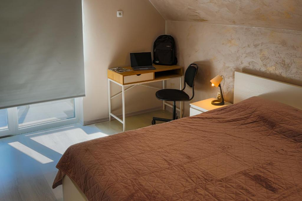 Postel nebo postele na pokoji v ubytování Sky Hills Apartment
