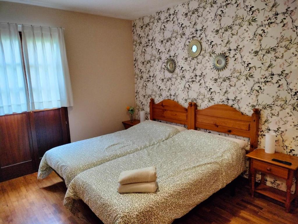 A bed or beds in a room at Valle la Fuente
