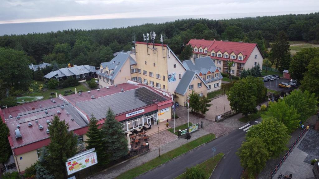 an overhead view of a town with buildings and a street at OWR Universal in Łazy