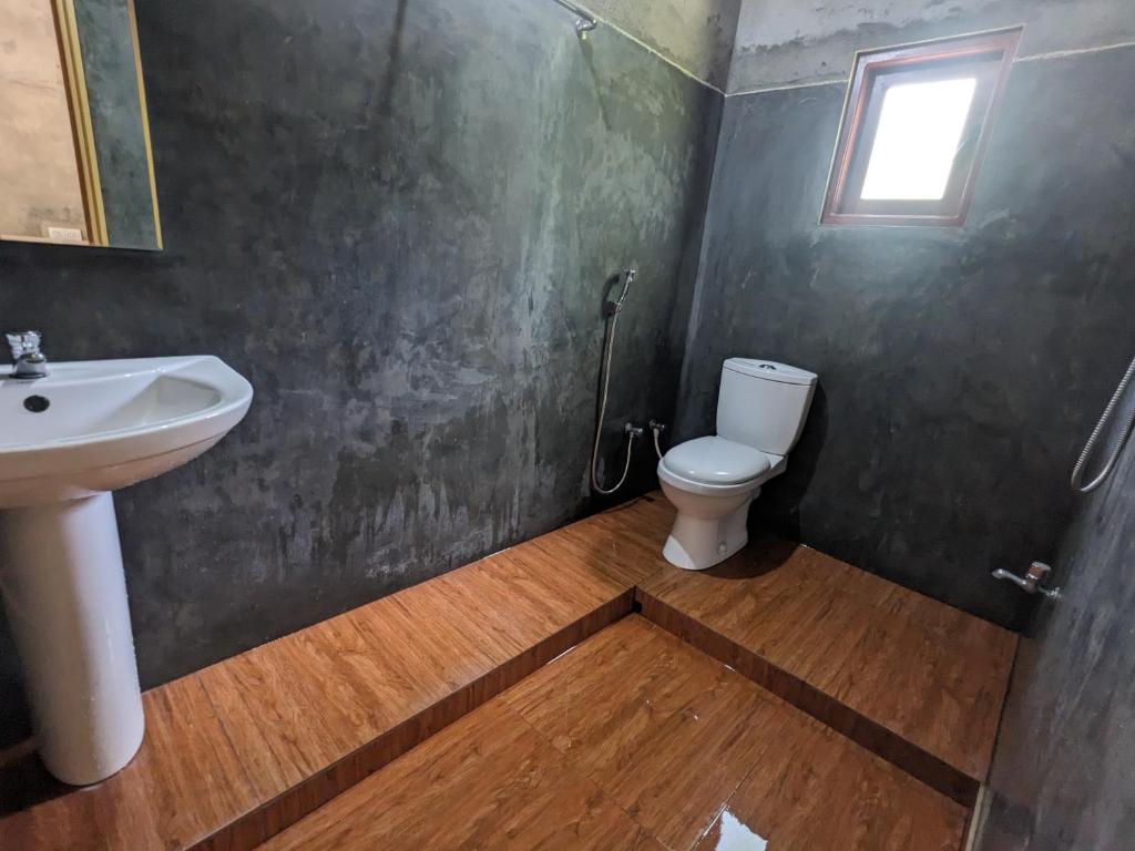 Koupelna v ubytování Afenta Motel- Mihintale