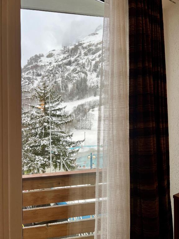 Nespecifikovaný výhled na hory nebo výhled na hory při pohledu z aparthotelu