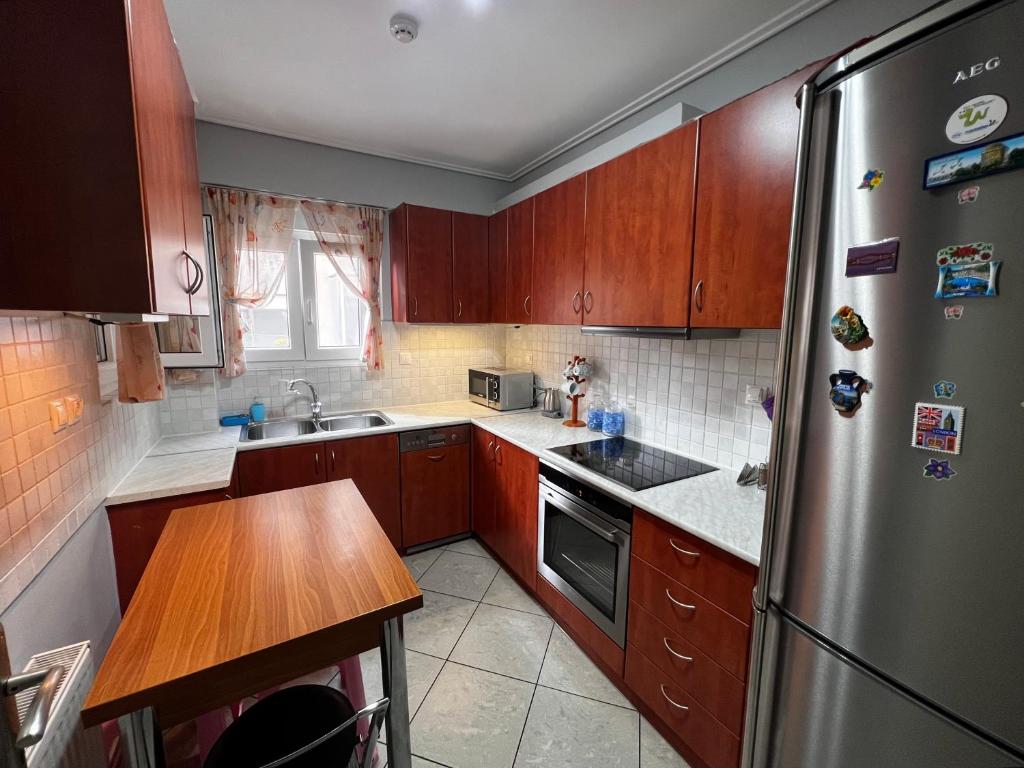 Kuchyň nebo kuchyňský kout v ubytování Premium Apartment In Chalkida