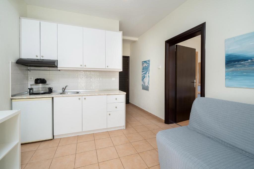 Kuchyň nebo kuchyňský kout v ubytování Dimar Apartments