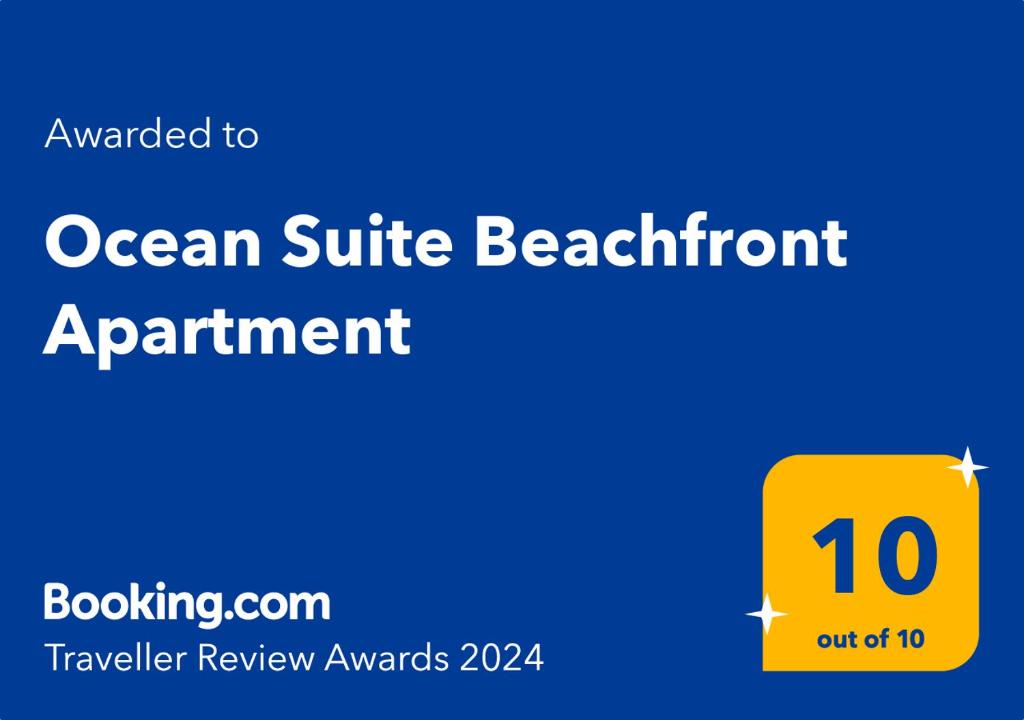 une image d'un panneau jaune avec un rendez-vous au bord de l'océan dans l'établissement Ocean Suite - Exceptional Beachfront Apartment - Candidasa, à Candidasa