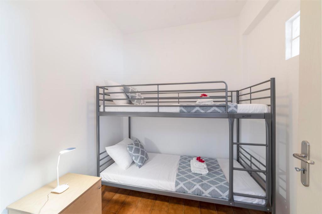 Postel nebo postele na pokoji v ubytování Elounda Summer Apt