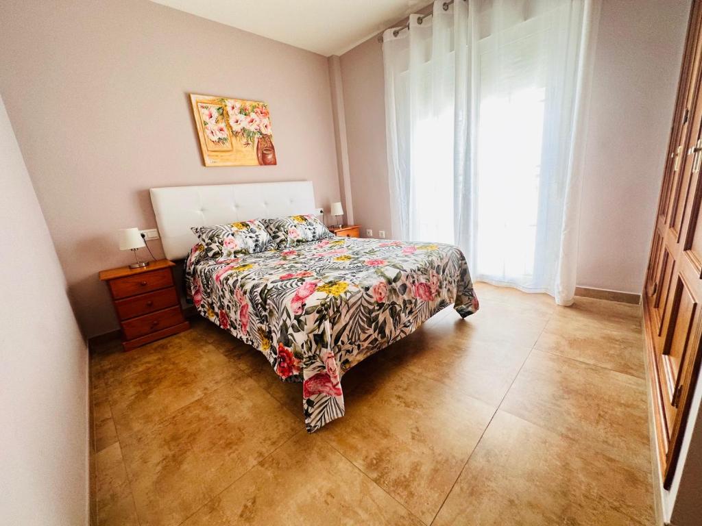 Postel nebo postele na pokoji v ubytování Ático con piscina privada en el corazón de Nerja!