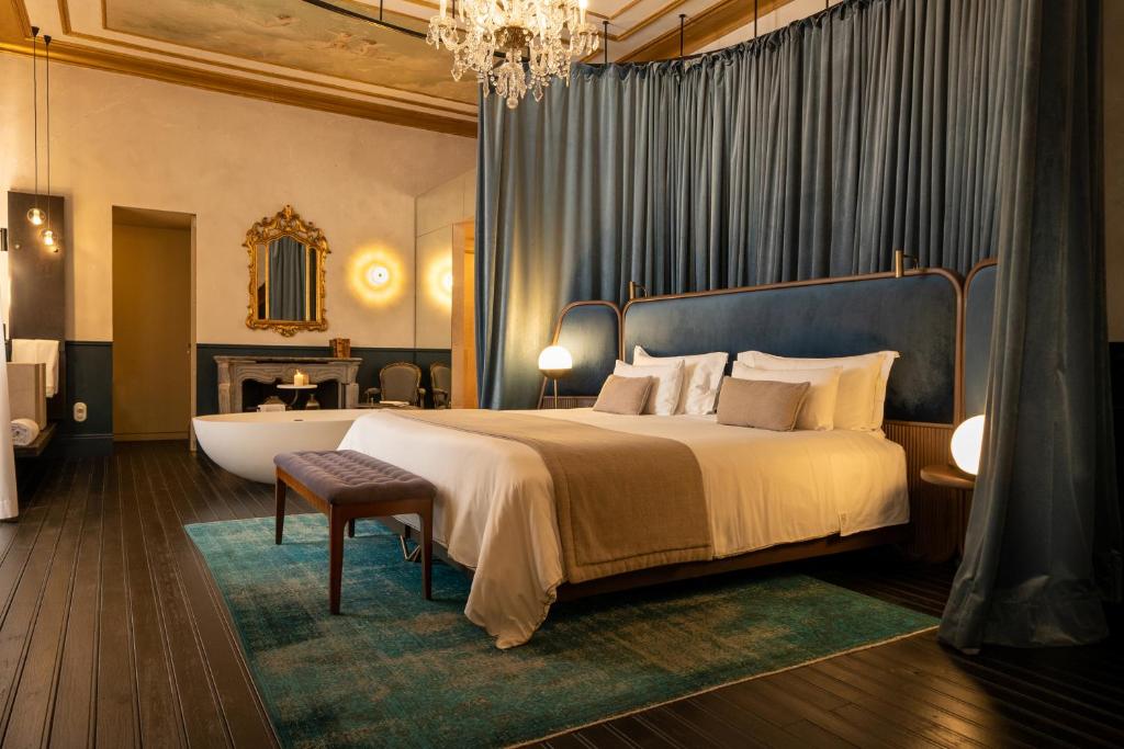 Can Bordoy Grand House Hotel GL Preferred Hotel客房内的一张或多张床位
