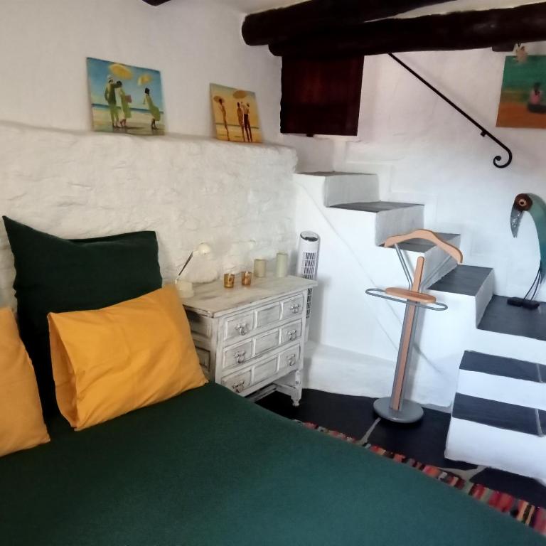 Postel nebo postele na pokoji v ubytování La Casita