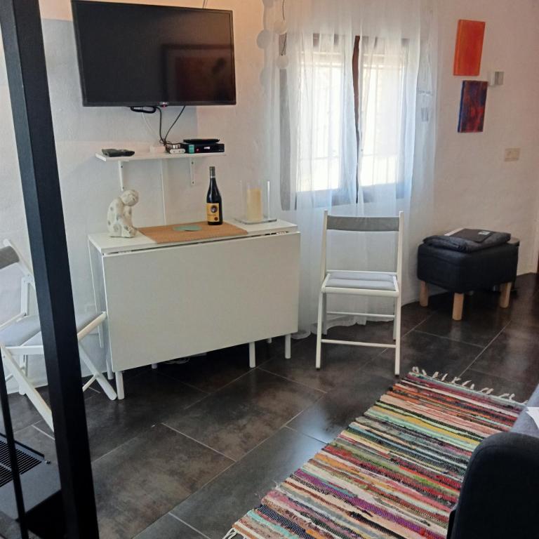 TV a/nebo společenská místnost v ubytování La Casita