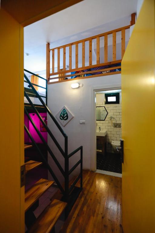 a view of a staircase in a house at Limon Inn Hotel, Taşucu in Tasucu