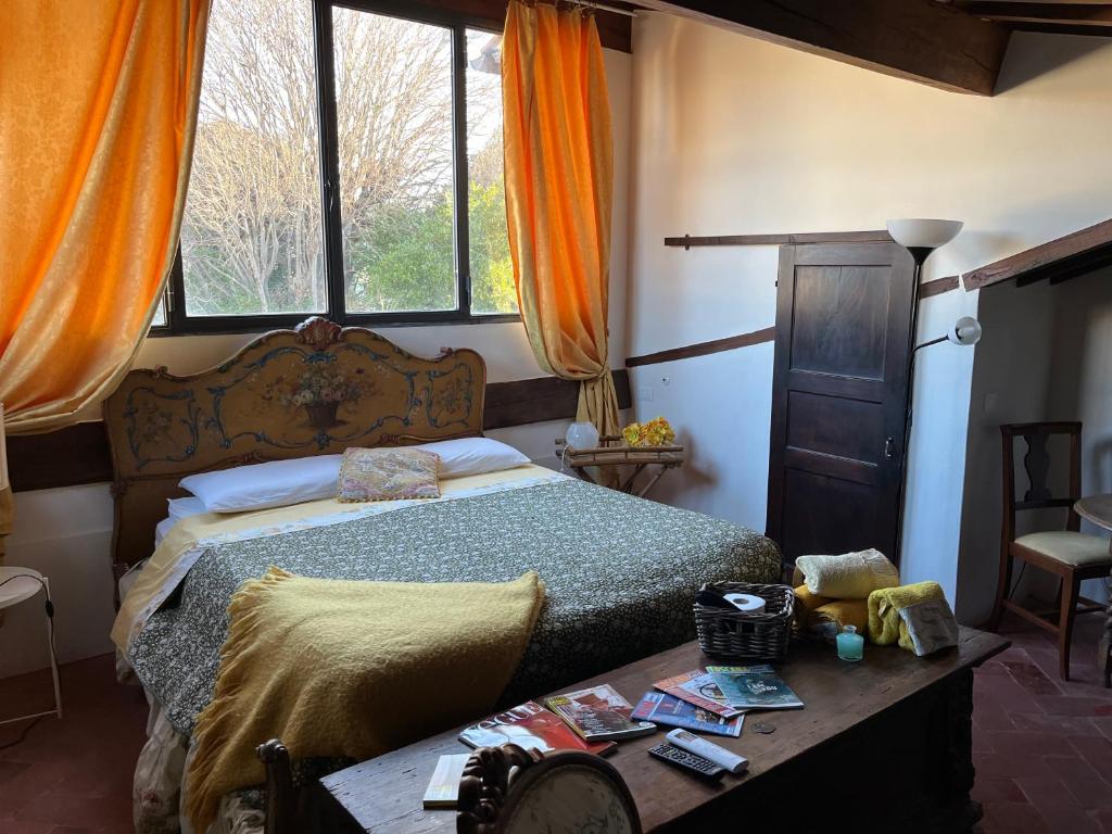 A bed or beds in a room at B&B Alla Corte dei Medici