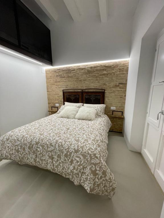 Postel nebo postele na pokoji v ubytování Al Civico 2 tiny house