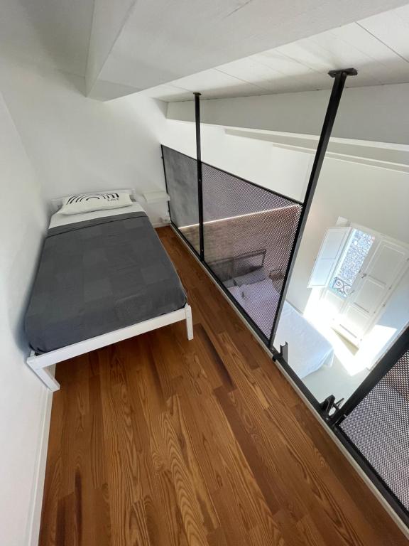 Postel nebo postele na pokoji v ubytování Al Civico 2 tiny house