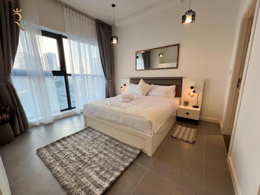 a bedroom with a bed with a mirror and a rug at 1BR Americana Apartment: Stars and Stripes Haven in Abu Dhabi