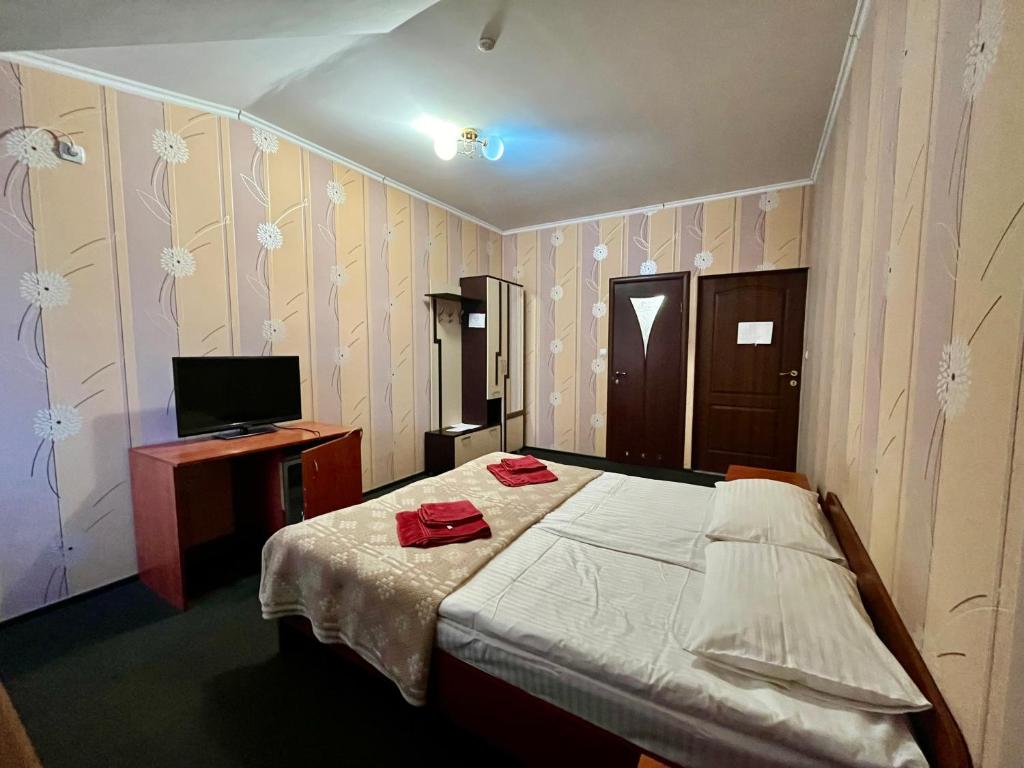 Postel nebo postele na pokoji v ubytování Domino