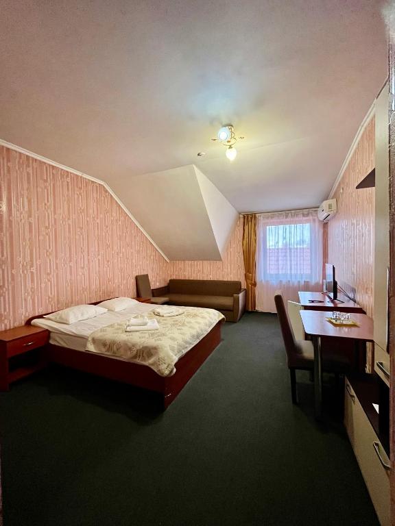 Postel nebo postele na pokoji v ubytování Domino