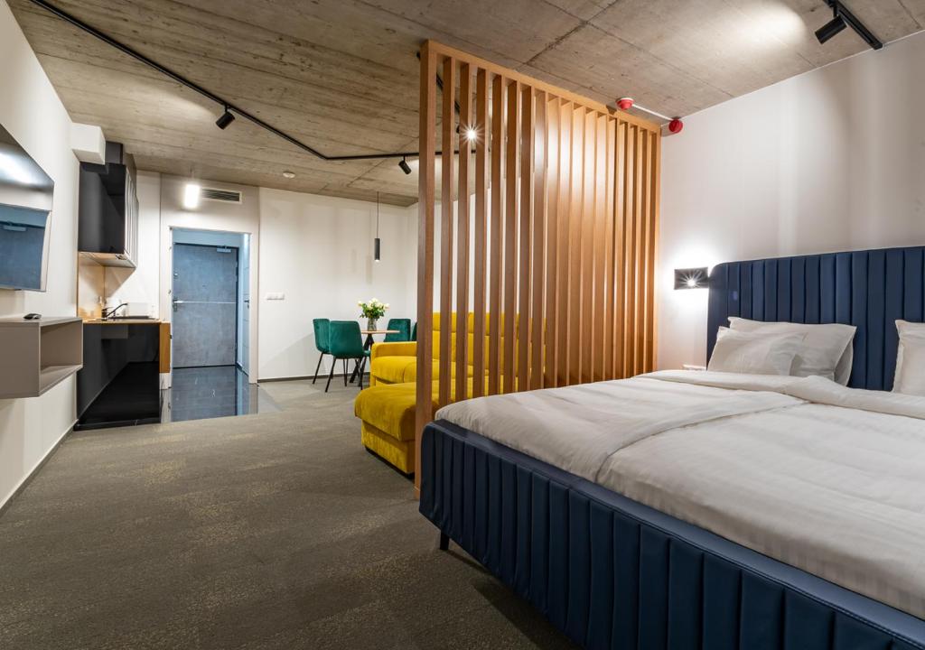 Postel nebo postele na pokoji v ubytování Noir Hotel
