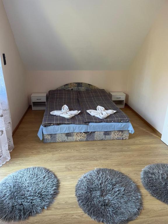 Postel nebo postele na pokoji v ubytování Ponty Apartman