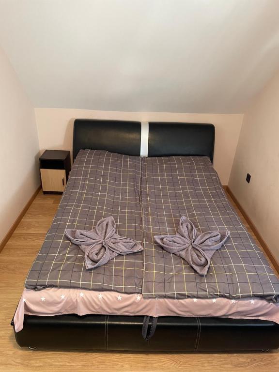 Postel nebo postele na pokoji v ubytování Ponty Apartman