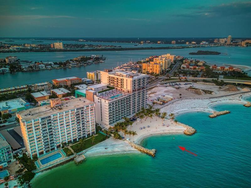 an aerial view of a resort in the ocean at 1612 - Beachfront Condo in Clearwater Beach