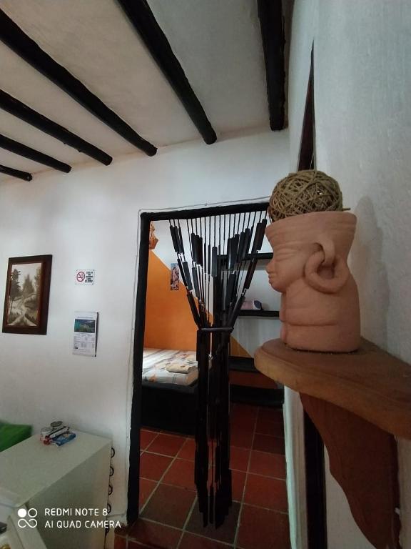 Postel nebo postele na pokoji v ubytování Cabañas Cañon Del Chicamocha