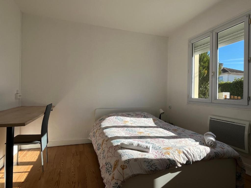 Posteľ alebo postele v izbe v ubytovaní Maison plain-pied Tarbes