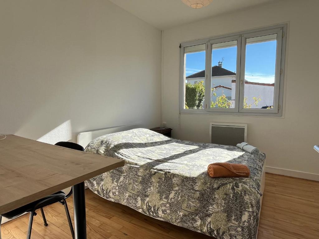 Posteľ alebo postele v izbe v ubytovaní Maison plain-pied Tarbes