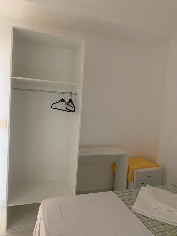 Postel nebo postele na pokoji v ubytování VIRASSOL Praia Hotel