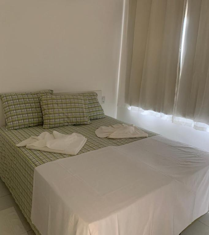 Postel nebo postele na pokoji v ubytování VIRASSOL Praia Hotel